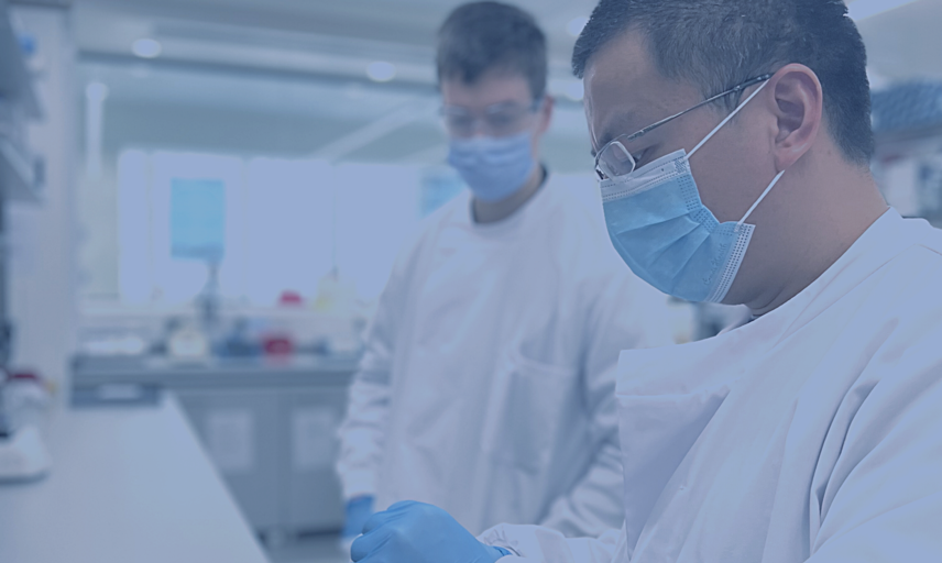 Banner image showing two scientists working together