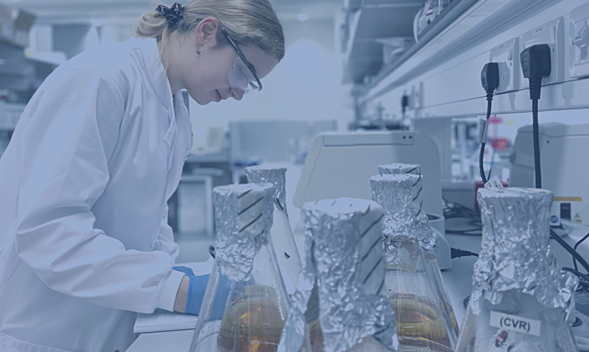 Banner Image showing a scientist working in a lab environment