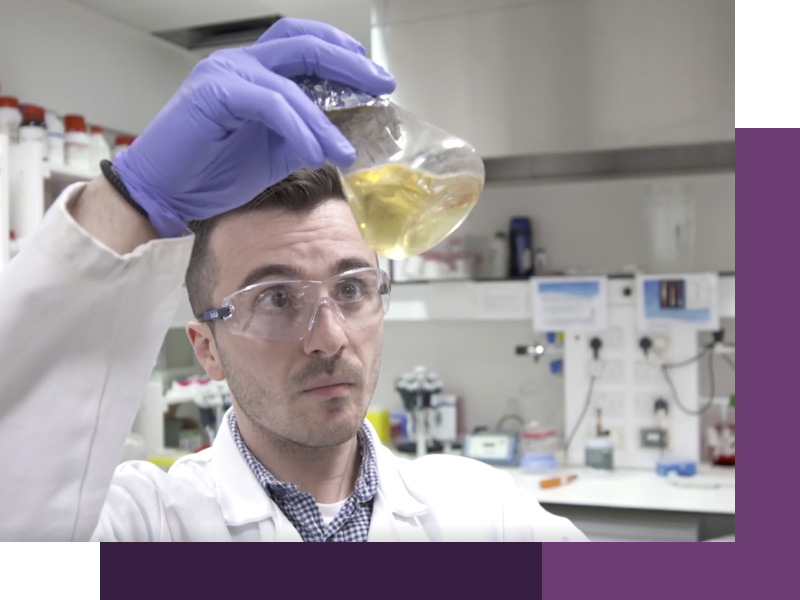 A photograph of Dr Francesco Fiorentino preforming a quality control on LB media.