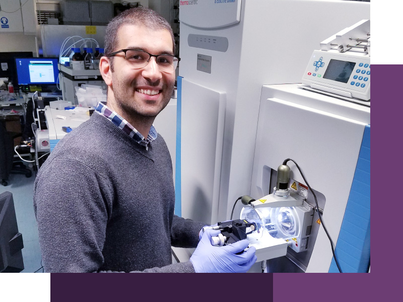 A photograph of Dr Tarick J. El-Baba using the UHMR, Mass spectrometer. 