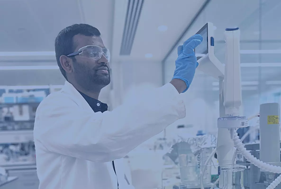 Banner image showing a scientist working.