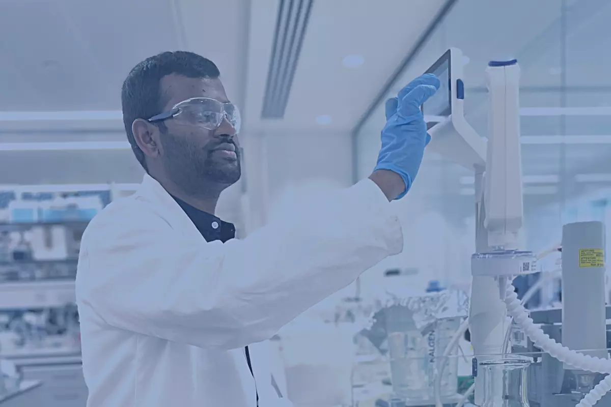Banner image showing a scientist working.